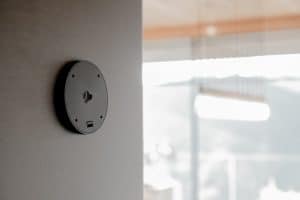 Discreet Josh Nano architectural microphone installed on a wall