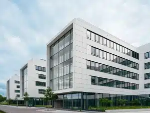 Modern building entrance with an IP video intercom and access control station