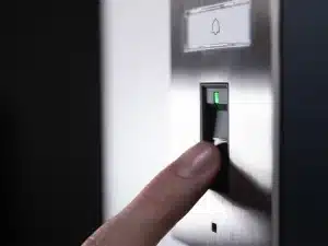 DoorBird video intercom with fingerprint access at a residential entrance
