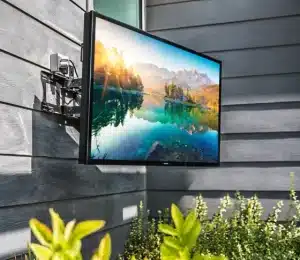 SunBrite outdoor television mounted on an exterior wall