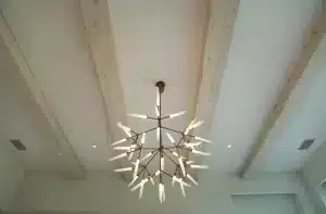 Round Sonance in-ceiling speaker integrated into a finished ceiling
