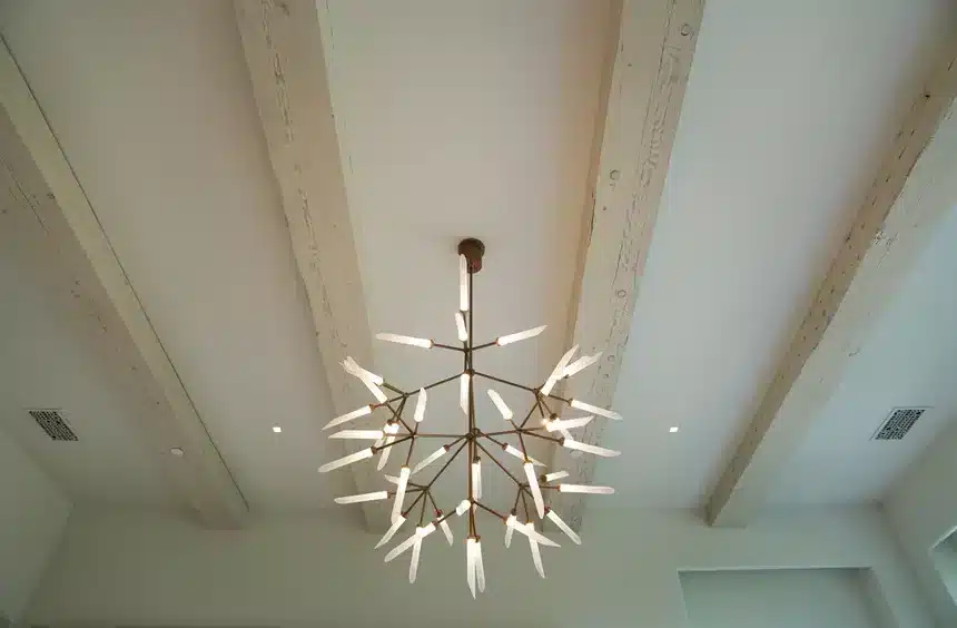 Round Sonance in-ceiling speaker integrated into a finished ceiling