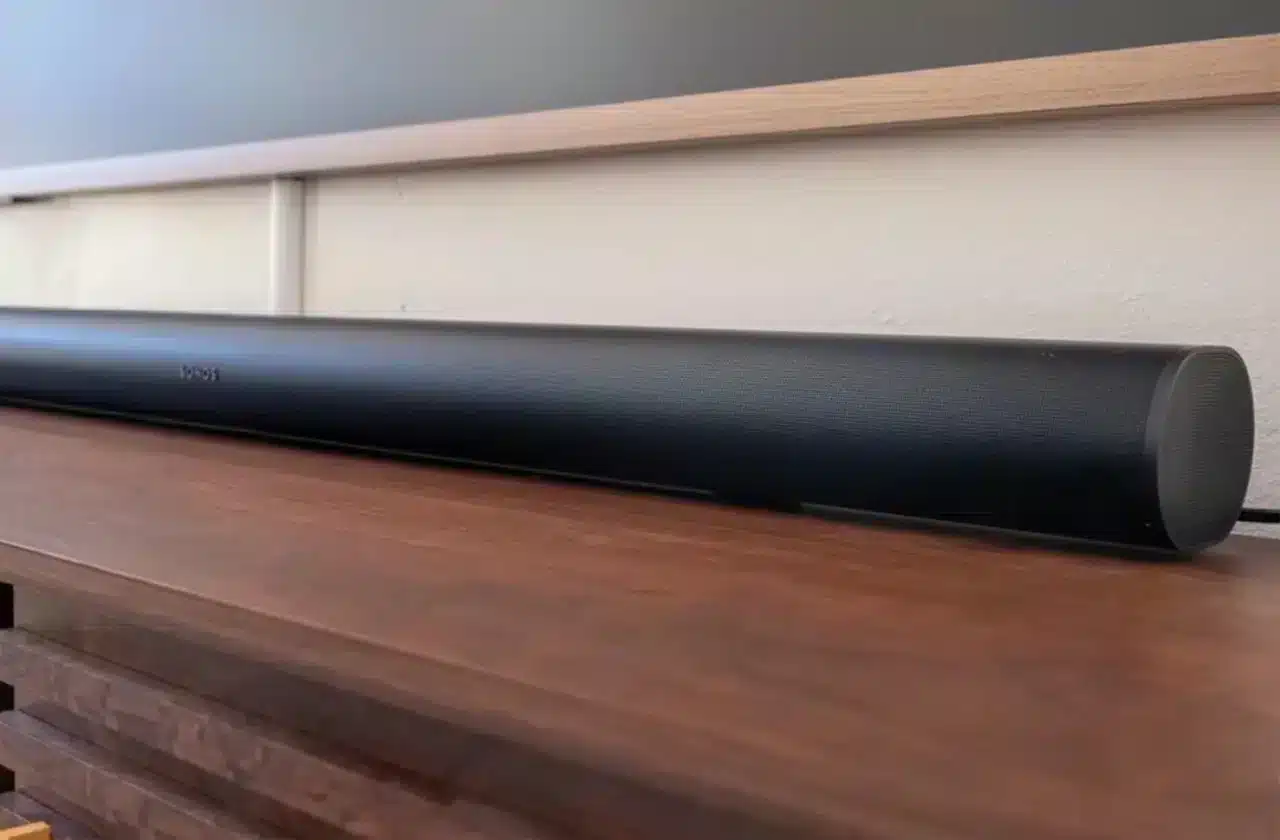 Sonos Arc Ultra mounted below a television in a contemporary living room